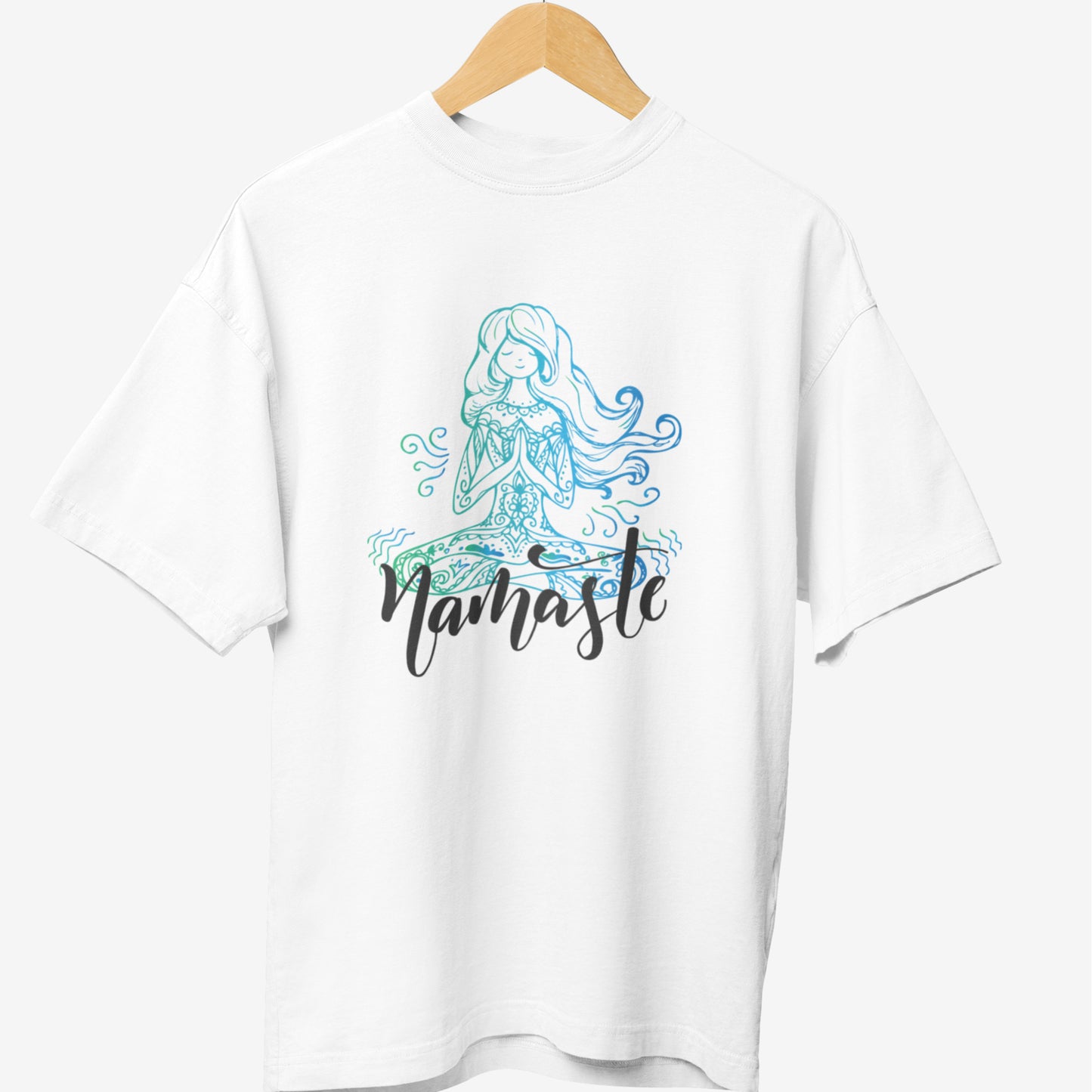 White yoga t-shirt featuring a serene, artistic illustration of a meditating woman with flowing hair and intricate patterns, accompanied by the word 'Namaste' in elegant script, symbolizing peace and mindfulness.