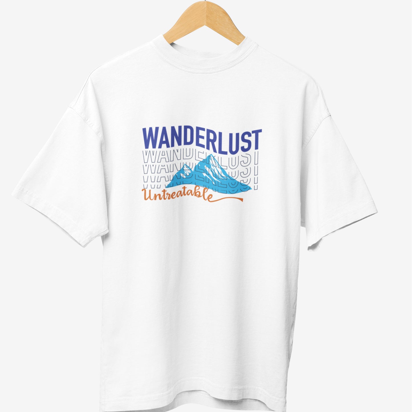 White travel t-shirt featuring the word 'WANDERLUST' in bold blue typography, a repeated faded text effect, a blue mountain illustration, and the phrase 'Untreatable' in stylish orange script