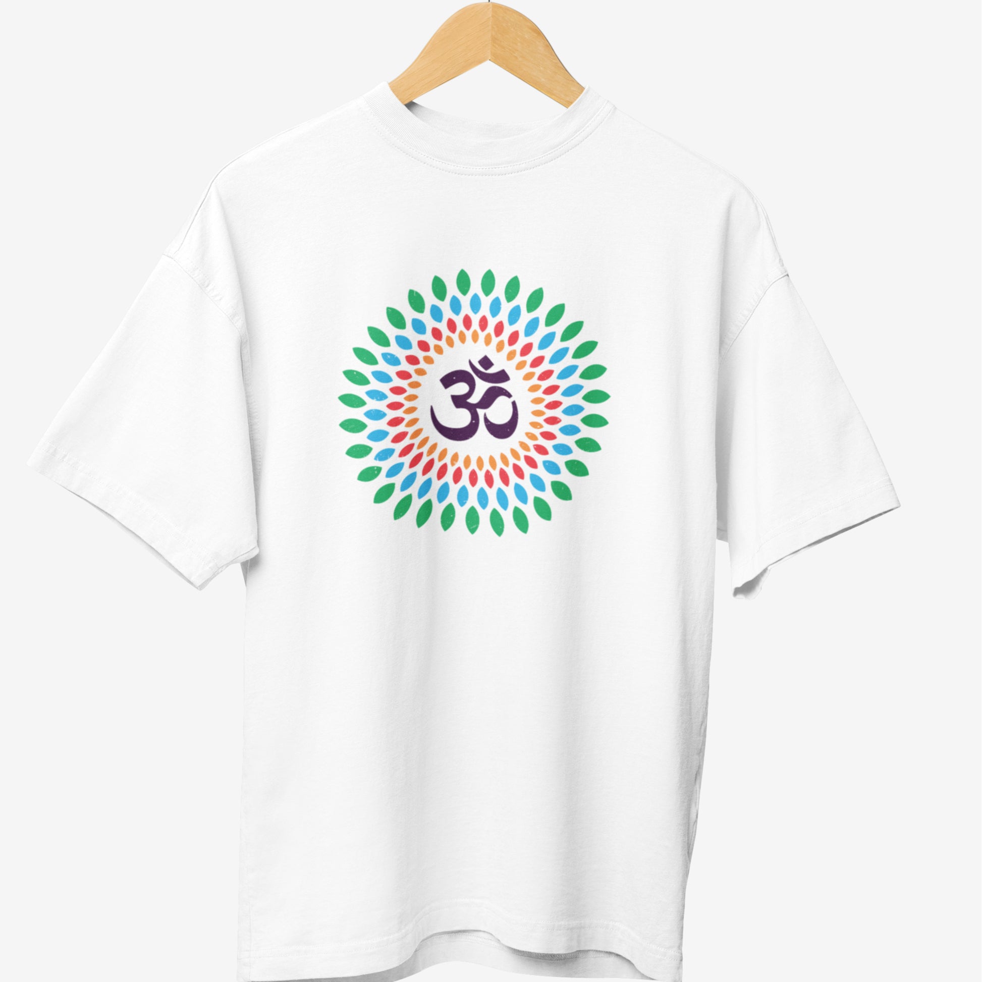 White yoga t-shirt featuring a colorful mandala design with green, blue, and red petal-like patterns surrounding a bold purple Om (Aum) symbol at the center, representing spirituality and mindfulness.